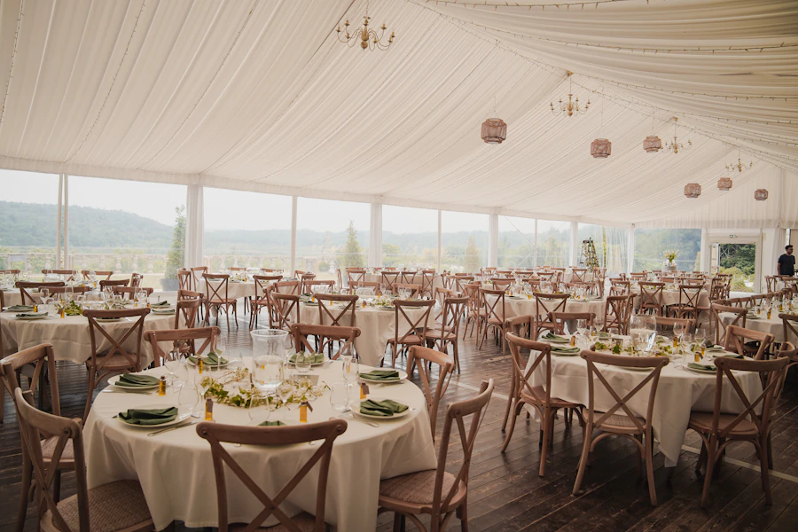 Event marquee with tables and chairs