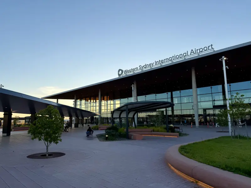 Western Sydney International Airport passenger forecourt at dusk